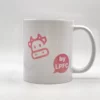 Mug rose artisanal fait à la main en Franche-Comté, avec l'expression "T'as meilleur temps" imprimée en rouge et noir, cadeau original.